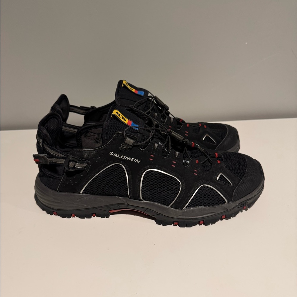 Salomon Black and Red Athletic Shoes with Rugged Sole